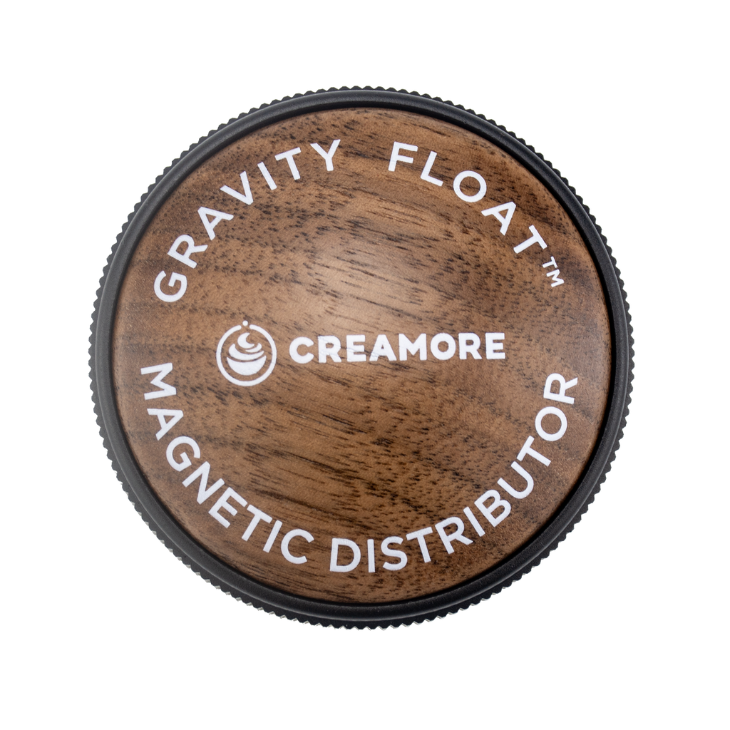 Creamore GRAVITY-FLOAT 58mm distributor in use on a 58mm portafilter