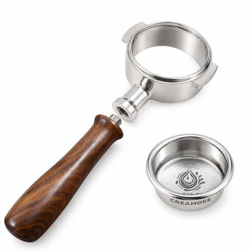 Creamore 58mm bottomless portafilter with detached walnut handle and Arcflow basket on white.